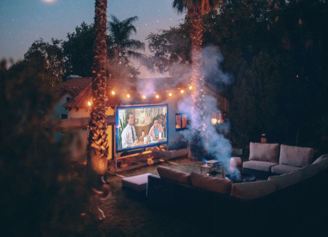 backyard movie projection with campfire - hsvsheds.com